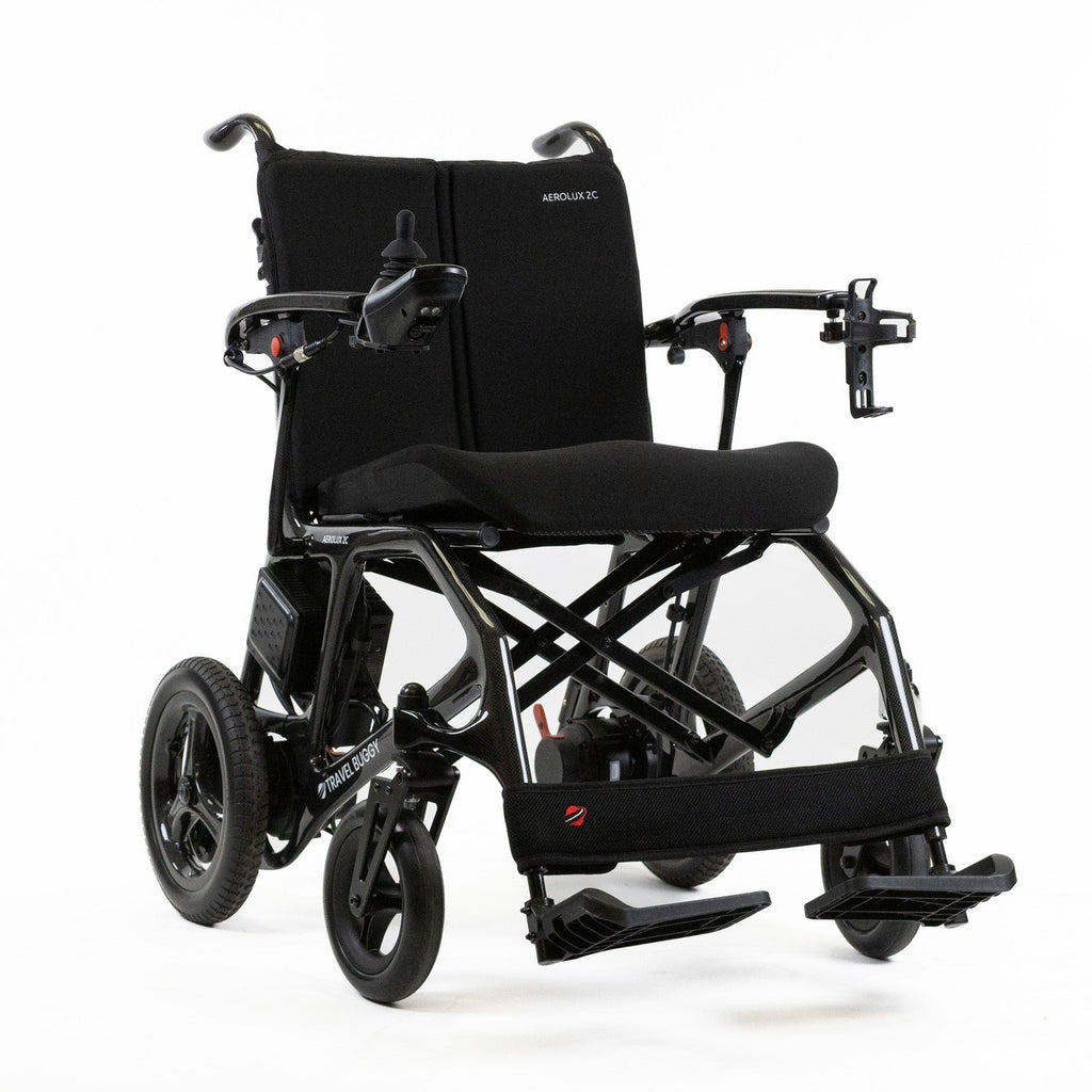 Travel Buggy AEROLUX 2C ultra-light folding power wheelchair, carbon black — right angle view
