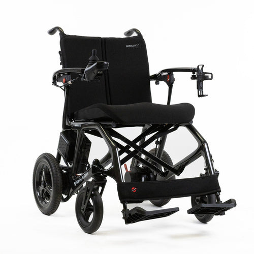Travel Buggy AEROLUX 2C ultra-light folding power wheelchair, carbon black — right angle view